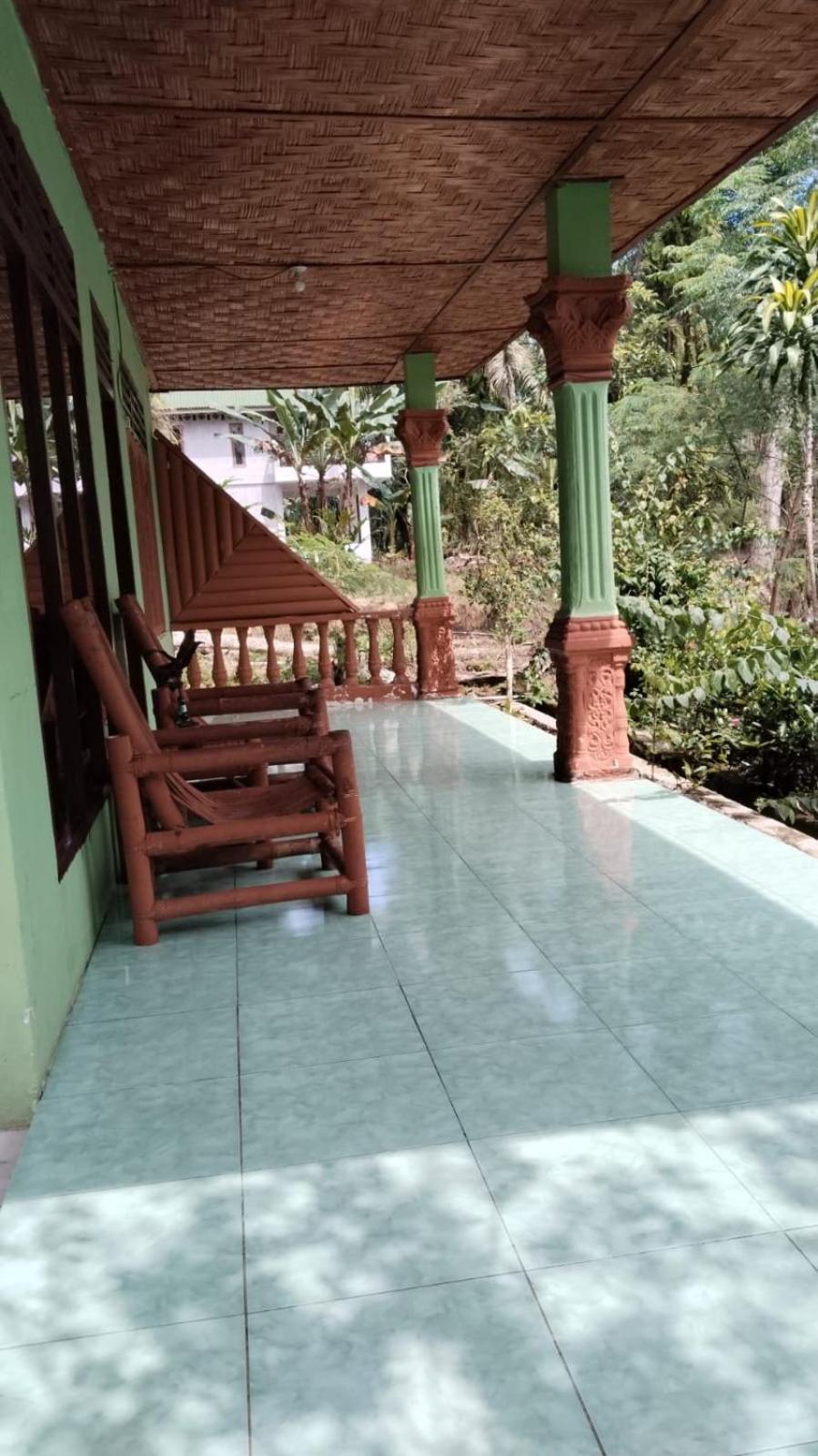 Wisma Batu Mandi Bukit Lawang Exterior photo